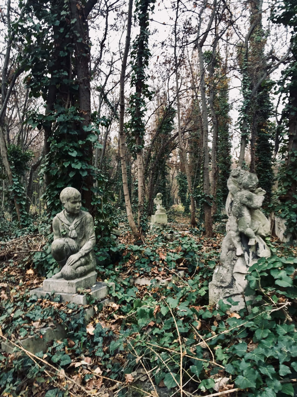 children-statues-budapest-cemetery